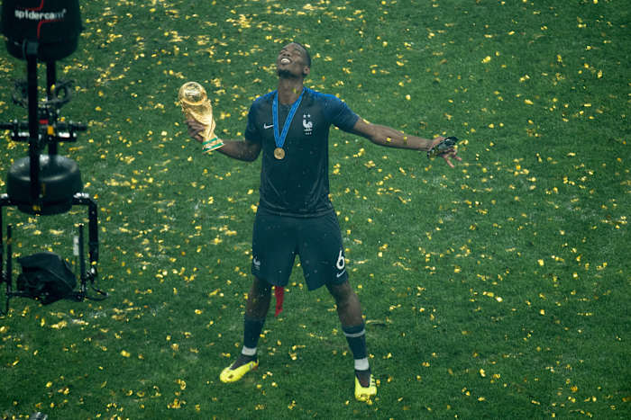 Paul Pogba pictured holding the World Cup trophy after helping France beat Croatia in the 2018 final